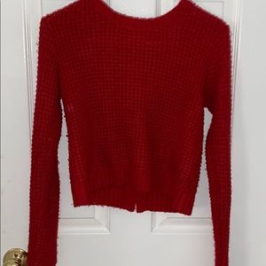 Bright red long sleeve sweater